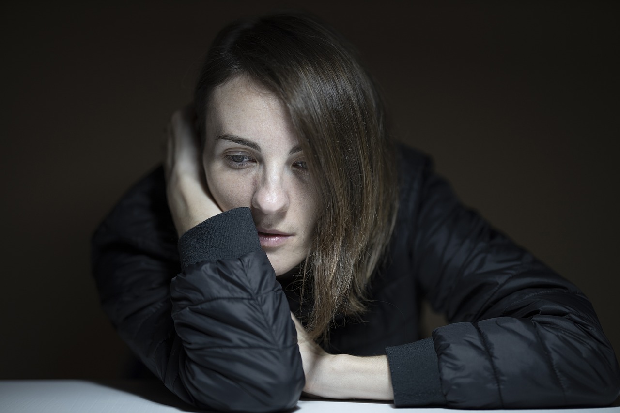 Woman looking sad thinking about her marriage